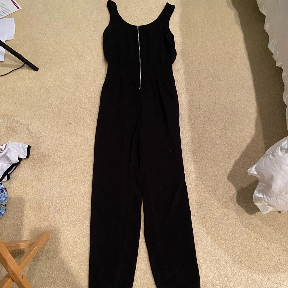 All black Jumpsuit w/silver zipper front